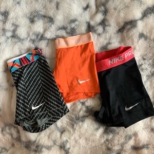 (3) Nike pro spandex shorts. Size small